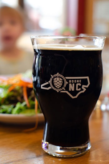 Stout beer and a salad at Lost Province Brewery