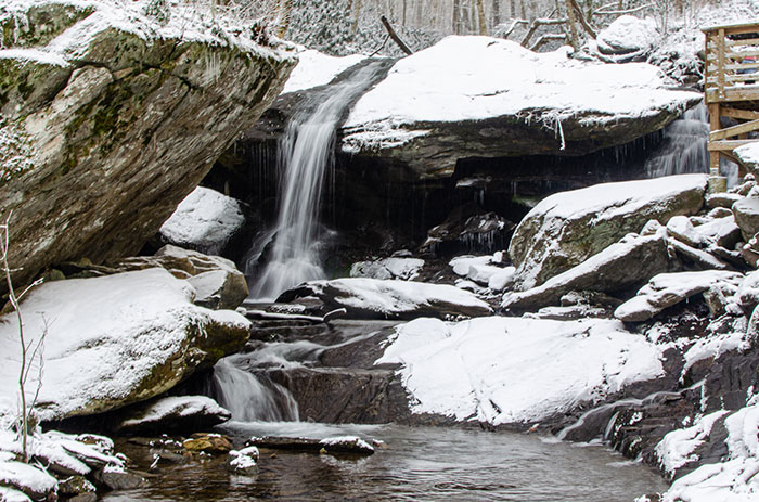 Otter falls rushing despite the winter cold. 