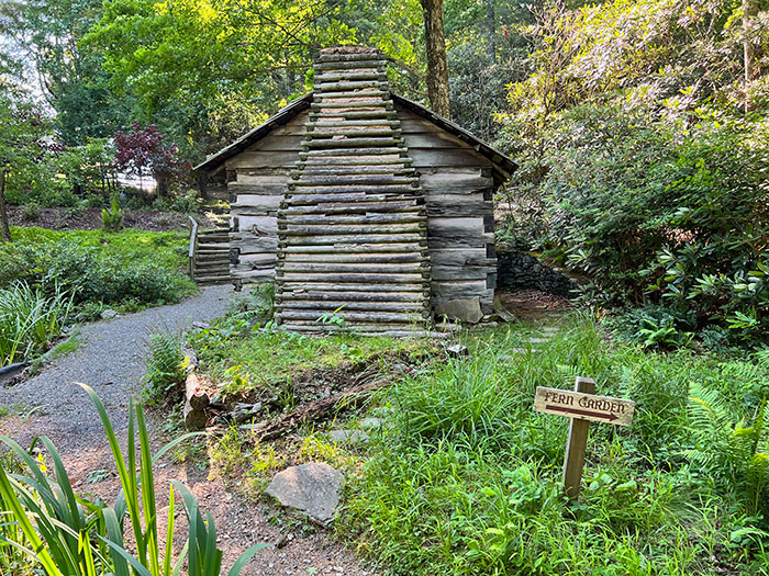 old rustic cabin in Daniel Boone Native Gardens. 